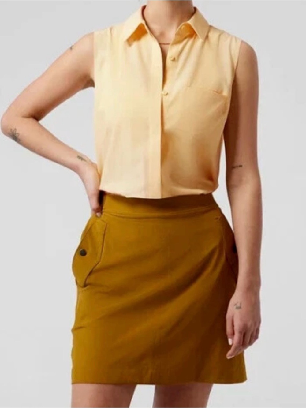 Athleta Urbanite Sleeveless Tank Shirt in Pale Butter Yellow size large